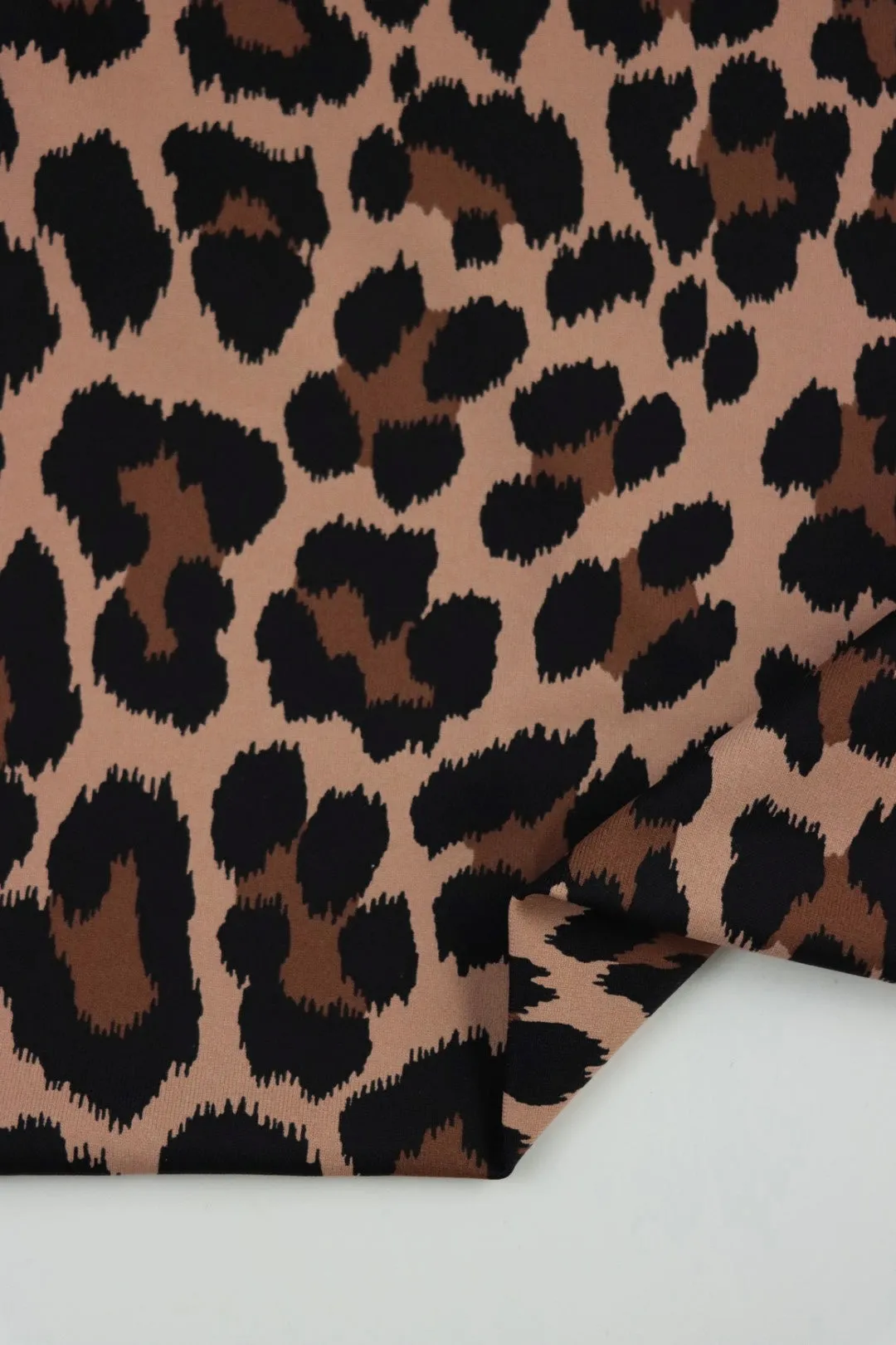 Cheetah on Bisque Matte Nylon Spandex Tricot | Designer Deadstock