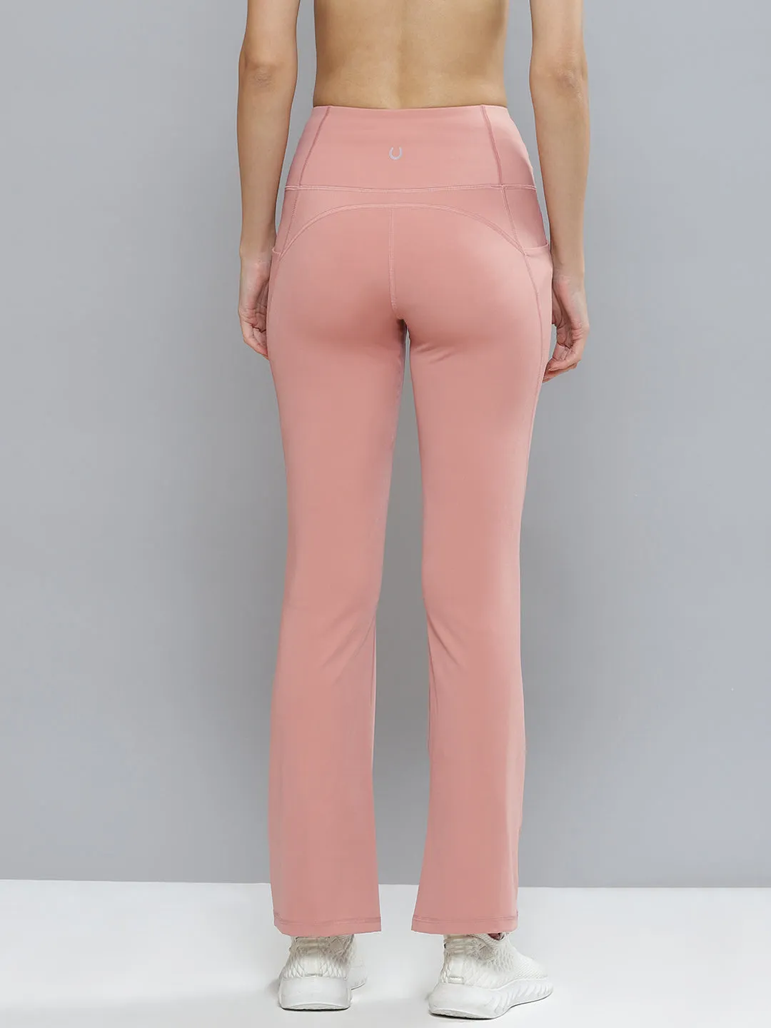 Women Peach Solid Bootcut Track Pants